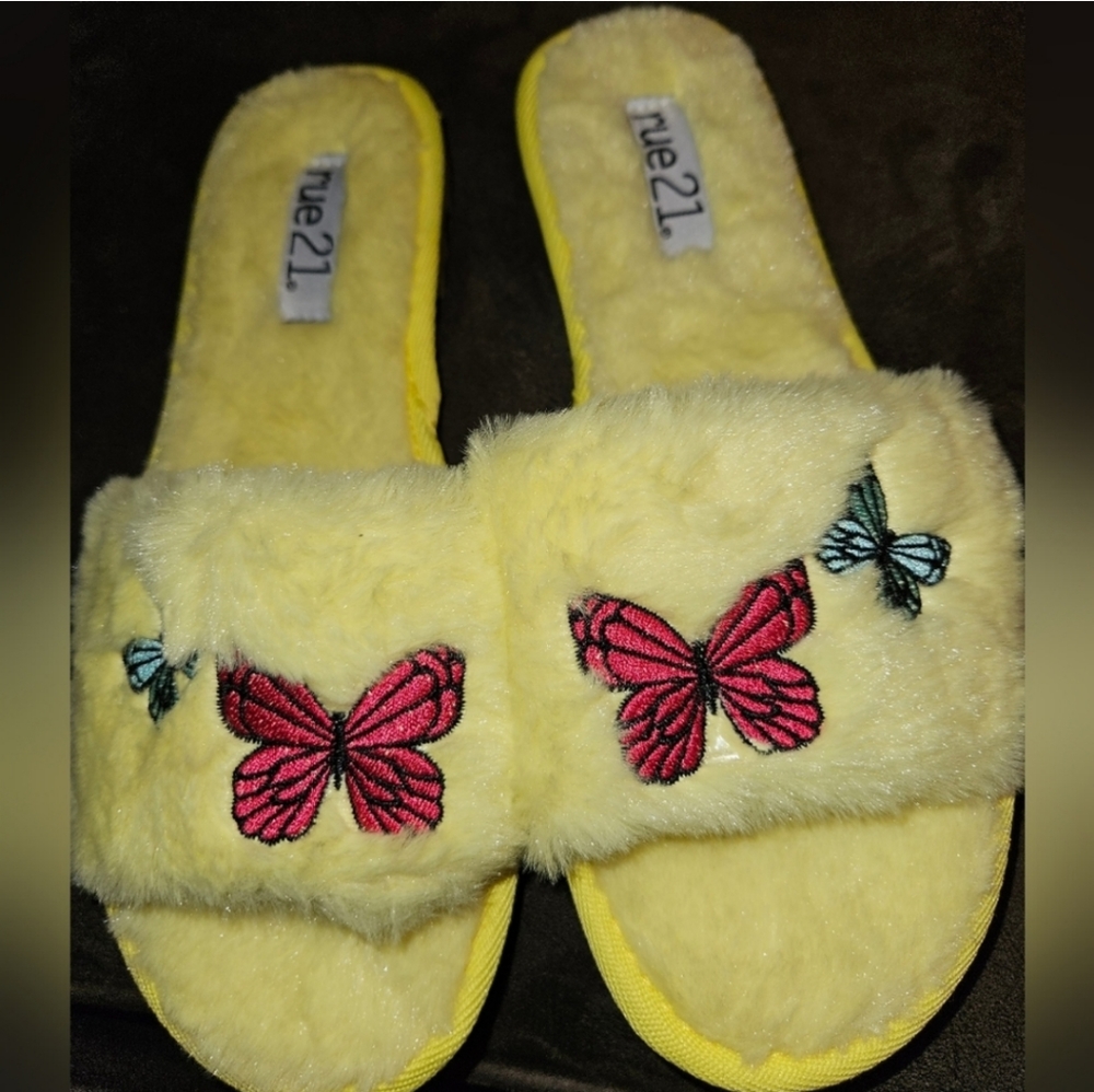 Rue21 Fuzzy slippers with butterflies with durable lug sole. Perfect for spring.